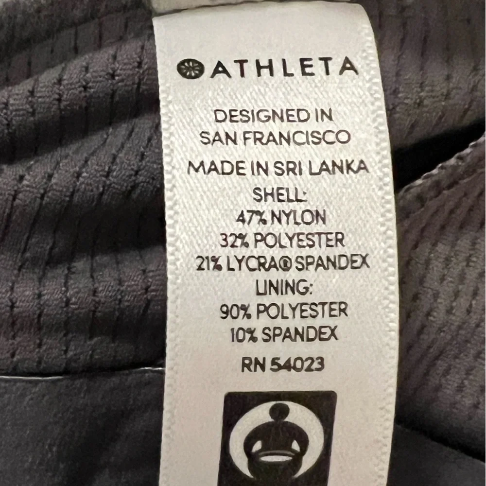 Athleta women’s Medium strappy Hyper Focused gray sports bra